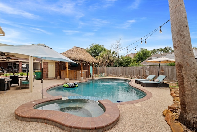 2802 Sandpebble Dr, Seabrook, TX 77586 - view of pool with a patio, a fenced backyard, a pool with connected hot tub, and a gazebo