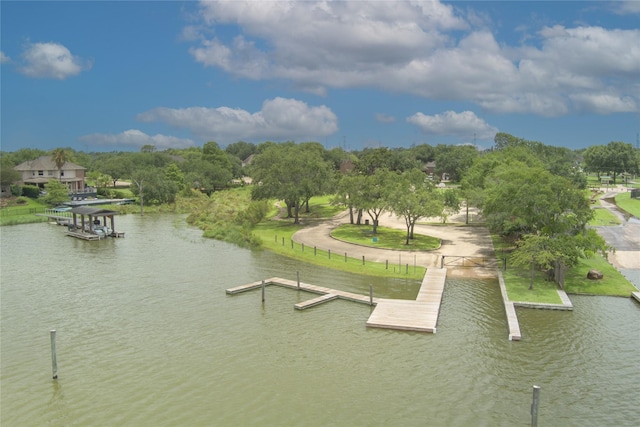 2802 Sandpebble Dr, Seabrook, TX 77586 - water view with a floating dock and a tree filled landscape
