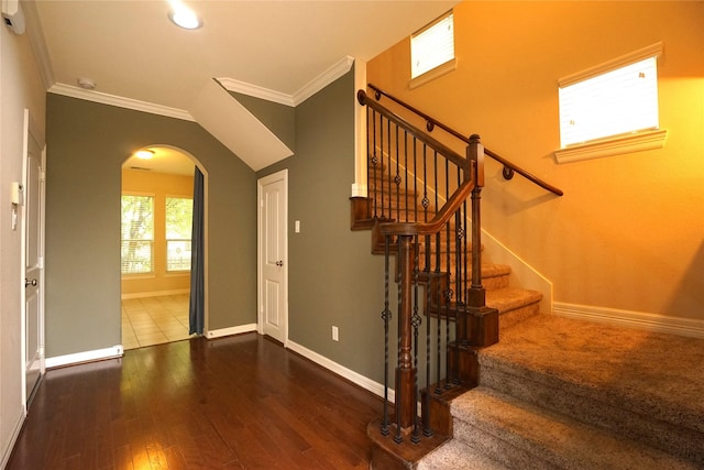 12248 Oxford Crescent Cir, Houston, TX 77082 - stairs with arched walkways, crown molding, wood finished floors, and recessed lighting