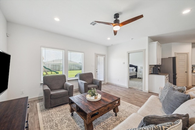 7714 Cattleman Valley Dr, Rosharon, TX 77583 - living room featuring ceiling fan, light wood-style flooring, and recessed lighting