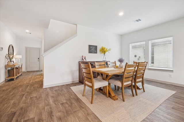 7714 Cattleman Valley Dr, Rosharon, TX 77583 - dining space featuring wood finished floors and recessed lighting