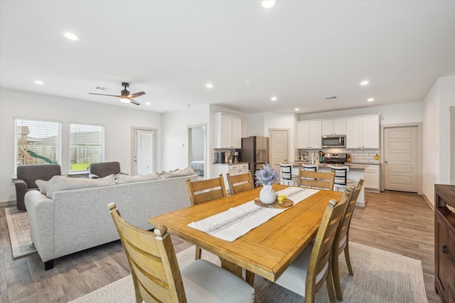 7714 Cattleman Valley Dr, Rosharon, TX 77583 - dining area with light wood-type flooring, recessed lighting, and a ceiling fan