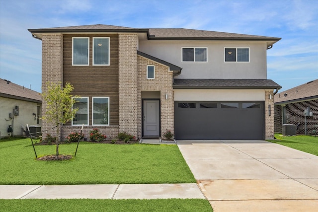 7714 Cattleman Valley Dr, Rosharon, TX 77583 - view of front of property featuring an attached garage, a front yard, driveway, brick siding, and stucco siding