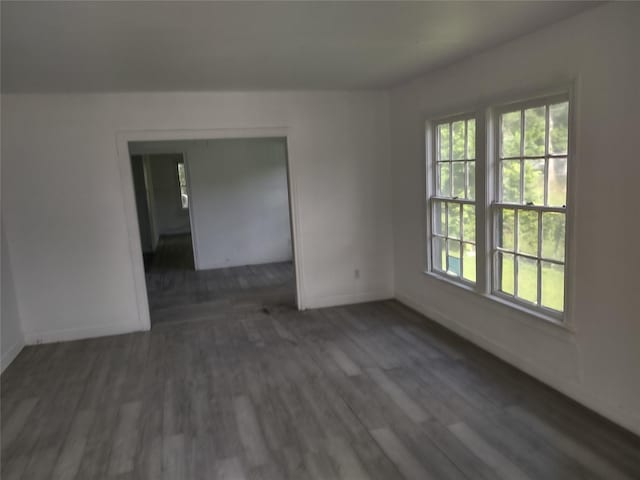 3950 Scranton St, Beaumont, TX 77703 - spare room with baseboards and wood finished floors