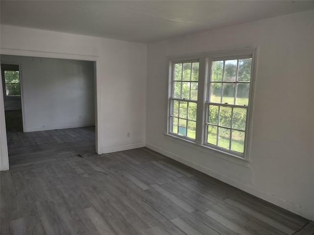 3950 Scranton St, Beaumont, TX 77703 - empty room with wood finished floors and baseboards