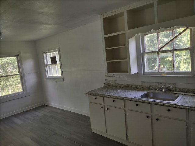 3950 Scranton St, Beaumont, TX 77703 - kitchen featuring white cabinets, wood finished floors, and open shelves
