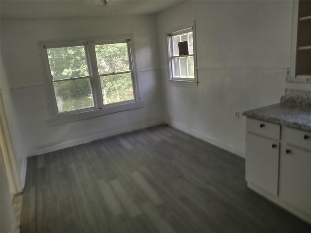 3950 Scranton St, Beaumont, TX 77703 - unfurnished dining area featuring wood finished floors and baseboards
