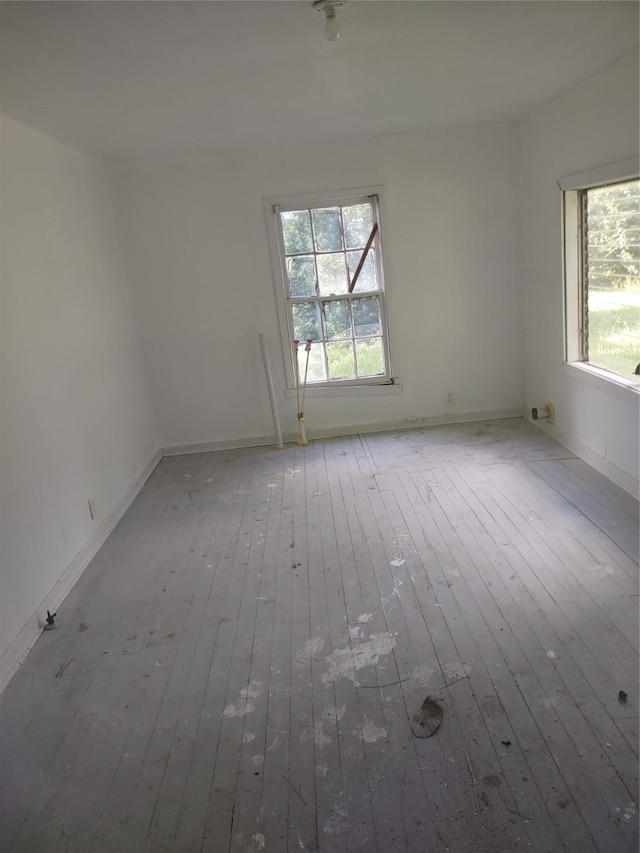 3950 Scranton St, Beaumont, TX 77703 - spare room with hardwood / wood-style flooring and baseboards