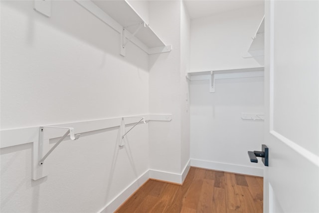1124 Hogan St, Houston, TX 77009 - walk in closet featuring light wood-type flooring