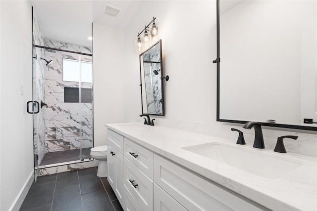 1124 Hogan St, Houston, TX 77009 - full bath featuring a marble finish shower, double vanity, and tile patterned floors