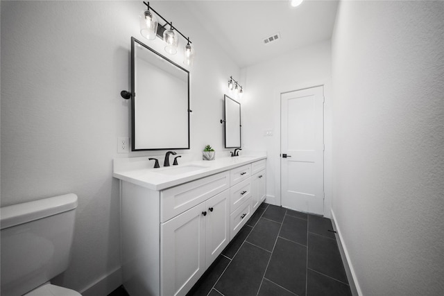 1124 Hogan St, Houston, TX 77009 - full bath with double vanity and tile patterned flooring