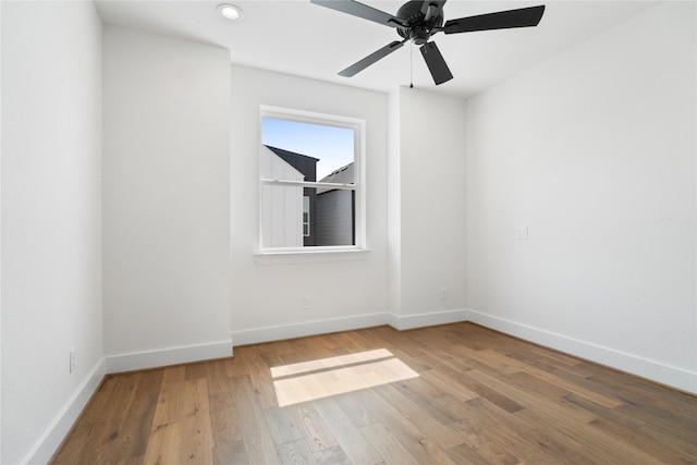 1124 Hogan St, Houston, TX 77009 - spare room featuring light wood finished floors, a ceiling fan, and recessed lighting