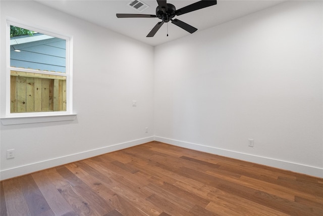 1124 Hogan St, Houston, TX 77009 - empty room with a ceiling fan and wood finished floors