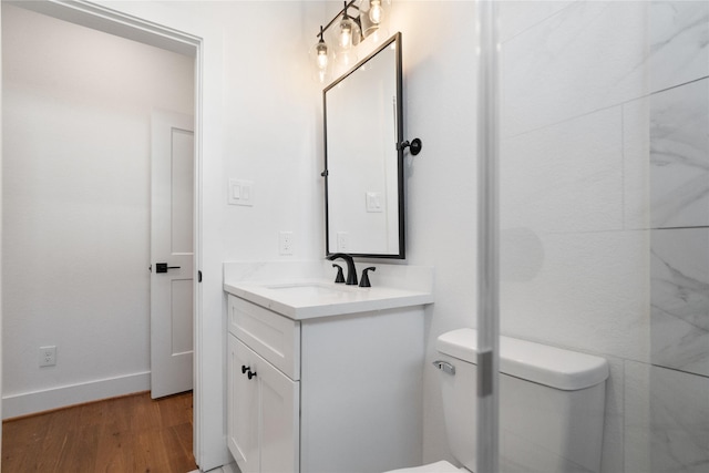 1124 Hogan St, Houston, TX 77009 - bathroom with vanity and wood finished floors