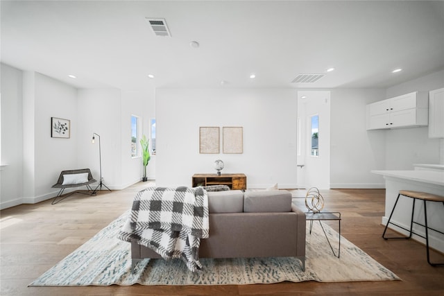 1124 Hogan St, Houston, TX 77009 - living area featuring recessed lighting and light wood finished floors