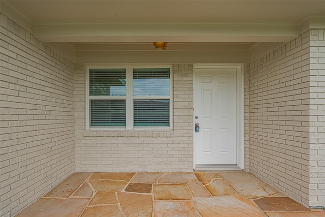 2401 33rd Ave N, Texas City, TX 77590 - doorway to property featuring brick siding