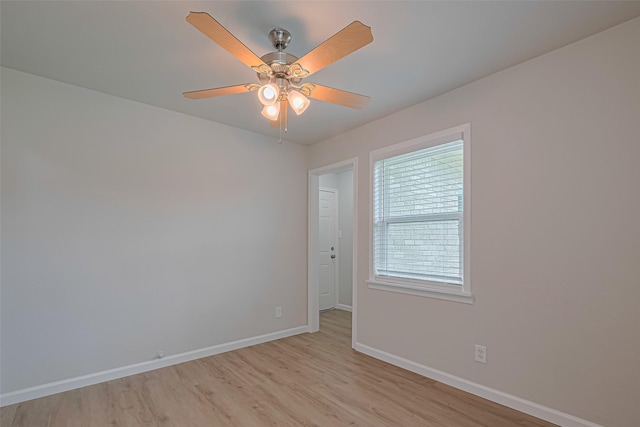 2401 33rd Ave N, Texas City, TX 77590 - unfurnished room featuring light wood-style floors and a ceiling fan