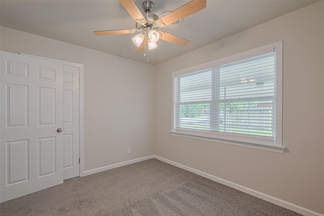 2401 33rd Ave N, Texas City, TX 77590 - unfurnished bedroom with carpet flooring and a ceiling fan