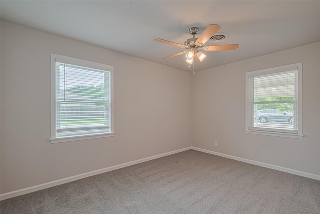 2401 33rd Ave N, Texas City, TX 77590 - carpeted spare room featuring baseboards and a ceiling fan