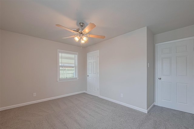 2401 33rd Ave N, Texas City, TX 77590 - unfurnished room featuring carpet flooring and ceiling fan