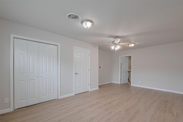 2401 33rd Ave N, Texas City, TX 77590 - unfurnished bedroom featuring light wood-style flooring and a ceiling fan