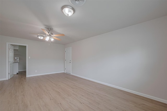 2401 33rd Ave N, Texas City, TX 77590 - empty room featuring ceiling fan and light wood-style floors