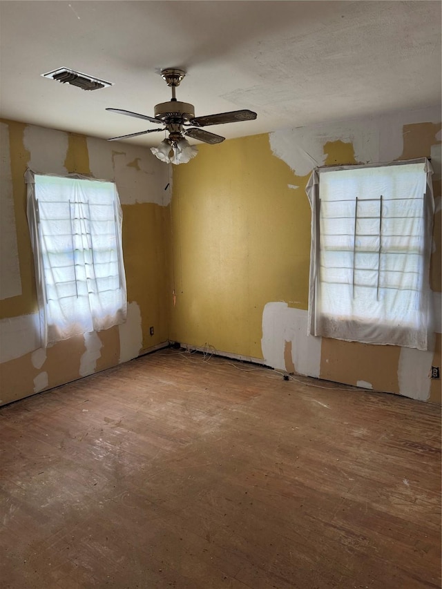 5050 Nassau Rd, Houston, TX 77021 - empty room with a ceiling fan and wood finished floors