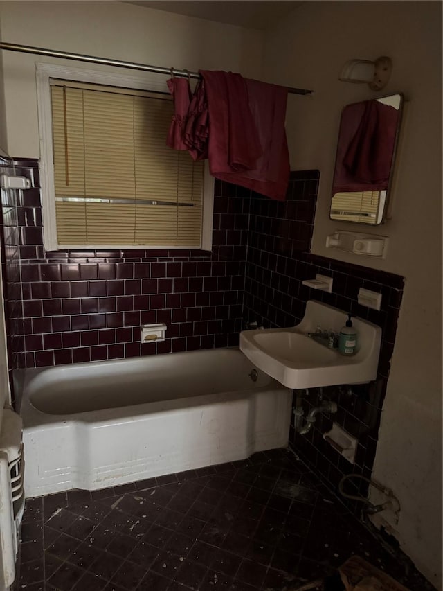 5050 Nassau Rd, Houston, TX 77021 - bathroom featuring a tub to relax in and a sink