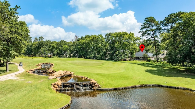 13727 Fountainview Dr, Montgomery, TX 77356 - surrounding community featuring view of wooded area, view of golf course, and a yard