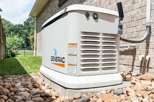 13727 Fountainview Dr, Montgomery, TX 77356 - exterior view of a power unit and stone siding