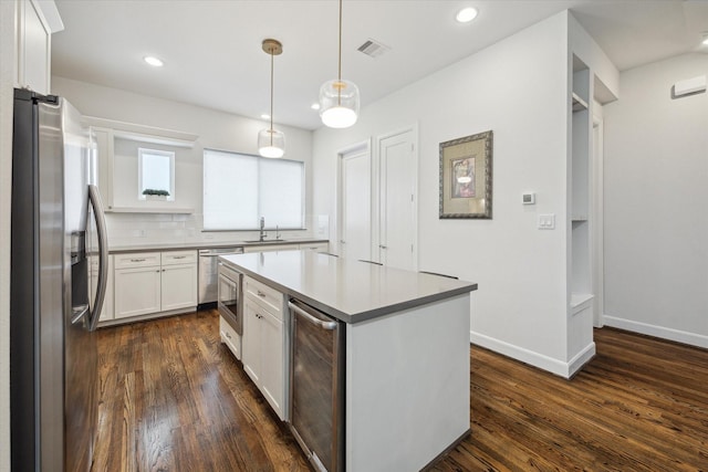 1050 Timbergrove Yards Ln, Houston, TX 77008 - kitchen featuring stainless steel appliances, wine cooler, dark wood-style flooring, white cabinetry, and light countertops
