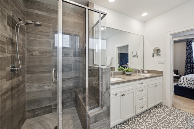 1050 Timbergrove Yards Ln, Houston, TX 77008 - bathroom featuring connected bathroom, double vanity, a shower stall, and recessed lighting