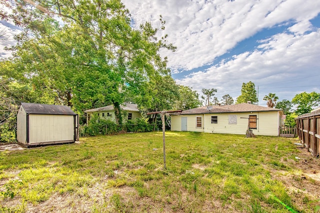 8022 Talton St, Houston, TX 77028 - fenced backyard with a storage unit