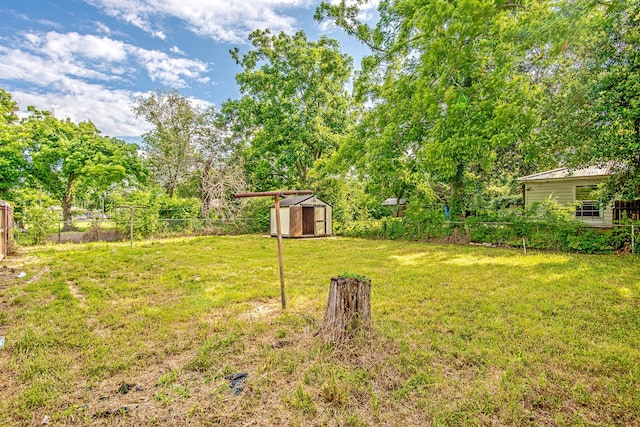 8022 Talton St, Houston, TX 77028 - fenced backyard featuring a storage unit