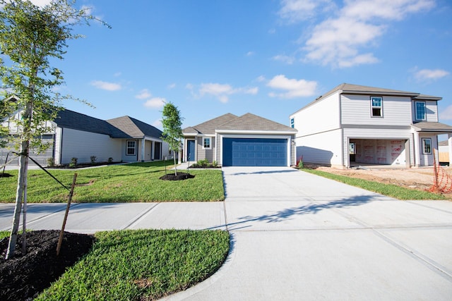 8104 Vanilla Orchid Dr, Houston, TX 77016 - view of front of home with concrete driveway, a front lawn, and an attached garage