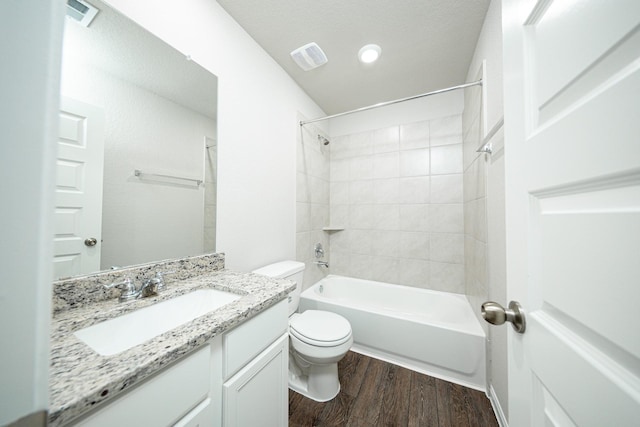 8104 Vanilla Orchid Dr, Houston, TX 77016 - full bath featuring wood finished floors, vanity, tub / shower combination, and recessed lighting