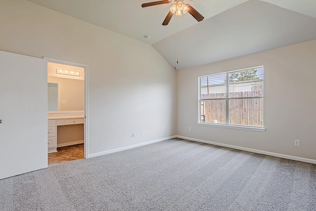 11230 Chelsea Oak St, Houston, TX 77065 - unfurnished bedroom featuring carpet floors, vaulted ceiling, ensuite bathroom, and ceiling fan