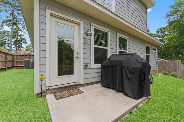 719 Cherokee Dr, Conroe, TX 77316 - doorway to property featuring a patio