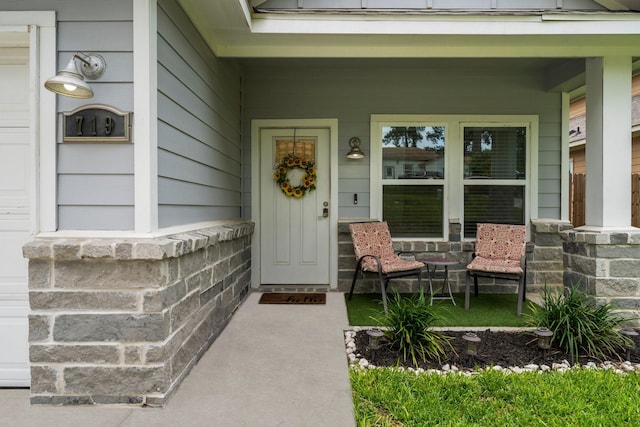 719 Cherokee Dr, Conroe, TX 77316 - doorway to property with a porch