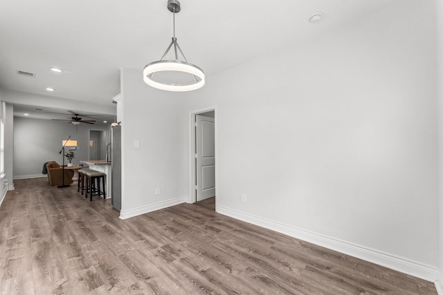 719 Cherokee Dr, Conroe, TX 77316 - dining area with wood finished floors, recessed lighting, and a ceiling fan