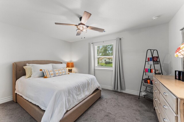 719 Cherokee Dr, Conroe, TX 77316 - bedroom with carpet flooring and a ceiling fan