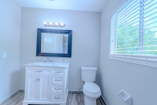 6507 Desert Rose Ln, Houston, TX 77086 - bathroom with vanity and wood finished floors
