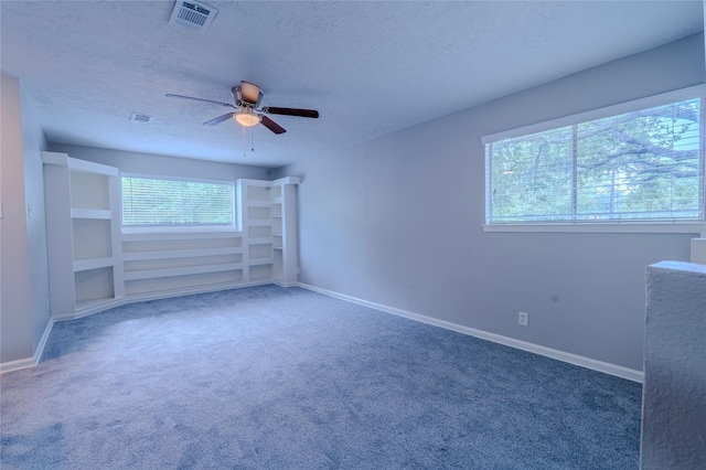 6507 Desert Rose Ln, Houston, TX 77086 - spare room featuring ceiling fan, a textured ceiling, and carpet