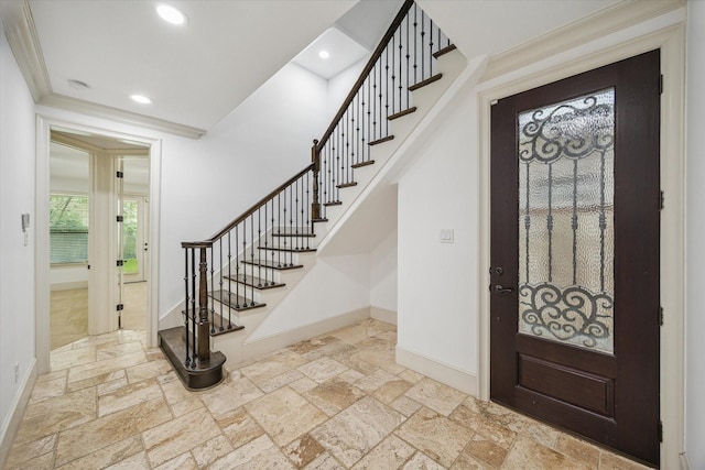 5411 Gibson St, Houston, TX 77007 - foyer entrance featuring stone tile floors, stairs, and recessed lighting