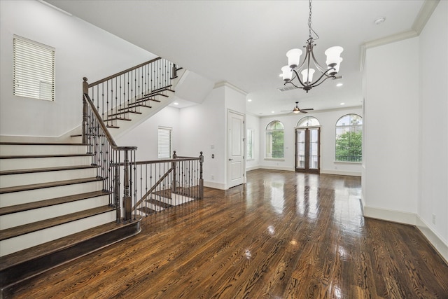 5411 Gibson St, Houston, TX 77007 - foyer with wood finished floors, a chandelier, ceiling fan, recessed lighting, and stairway