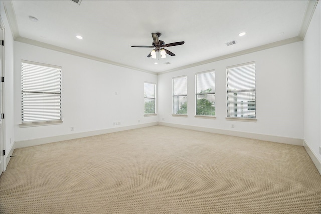5411 Gibson St, Houston, TX 77007 - spare room featuring light colored carpet, crown molding, ceiling fan, recessed lighting, and a smoke detector