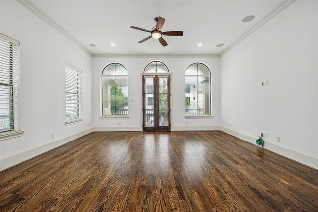 5411 Gibson St, Houston, TX 77007 - unfurnished room featuring ornamental molding, ceiling fan, plenty of natural light, and wood finished floors