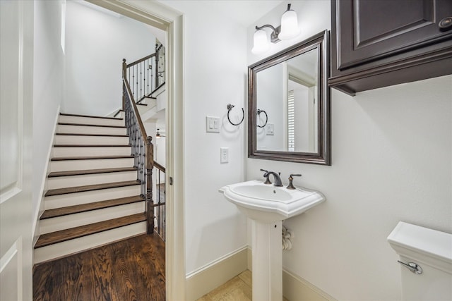 5411 Gibson St, Houston, TX 77007 - half bath featuring toilet and wood finished floors