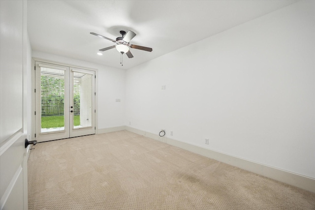5411 Gibson St, Houston, TX 77007 - empty room with ceiling fan, light colored carpet, and french doors