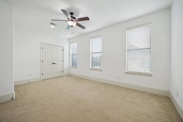 5411 Gibson St, Houston, TX 77007 - spare room with light colored carpet and a ceiling fan